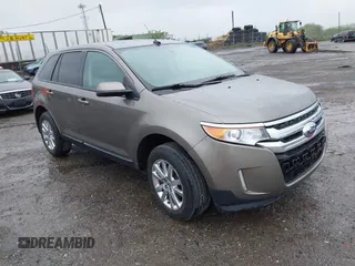 2014 Ford Edge SEL z VIN 2FMDK4JC0EBA36381, wystawiony jako IAAI lot #42236973 z przebiegiem 146 053 mil mil oraz . Historia ofert i sprzedaży dostępna na DreamBid. Obrazek 1.