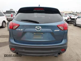 2016 Mazda CX-5 Grand Touring with VIN JM3KE2DY7G0875678, listed as a IAAI auction lot 42104888 with 30,566 mi miles. Bid and sale history available at carsss.com. Image 17.