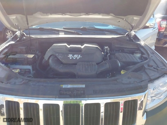 2013 Jeep Grand Cherokee Limited with VIN 1C4RJFBG5DC634023, listed as a IAAI auction lot 41828704 with 132,286 mi miles. Bid and sale history available at carsss.com. Image 10.
