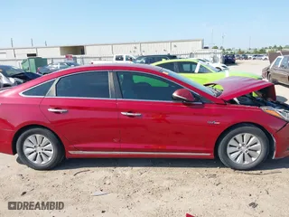 2016 Hyundai Sonata Hybrid SE with VIN KMHE24L19GA016239, listed as a IAAI auction lot 40813246 with 118,031 mi miles. Bid and sale history available at carsss.com. Image 13.