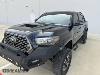 2023 Toyota Tacoma 4WD SR with VIN 3TYCZ5AN0PT110522, listed as a IAAI auction lot 41928557 with 45,116 mi miles. Bid and sale history available at carsss.com. Image 1.