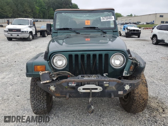 1999 Jeep Wrangler Sahara with VIN 1J4FY49S0XP489462, listed as a Copart auction lot 54750405 with 134,134 mi miles and Non repairable. Bid and sale history available at DreamBid. Image 5.