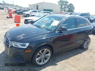 2016 Audi Q3 Premium Plus with VIN WA1EFCFS1GR022832, listed as a IAAI auction lot 42589704 with 118,915 mi miles and . Bid and sale history available at DreamBid. Image 2.