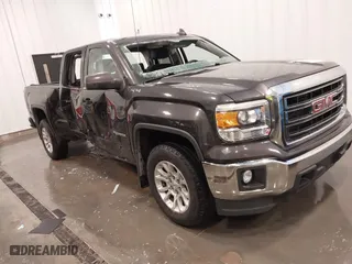 2015 GMC Sierra 1500 SLE with VIN 1GTV2UEC0FZ151760, listed as a IAAI auction lot 41988450 with 124,674 mi miles. Bid and sale history available at carsss.com. Image 1.