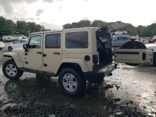 2011 Jeep Wrangler Unlimited Sahara with VIN 1J4BA5H19BL593658, listed as a Copart auction lot 71947684 with 122,323 mi miles and Salvage Title. Bid and sale history available at carsss.com. Image 2.