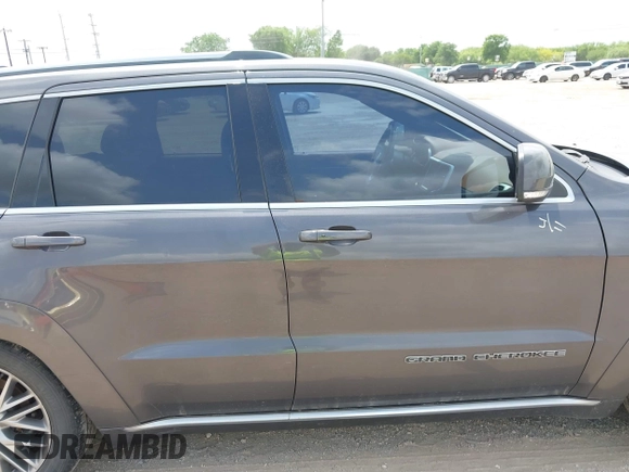 2018 Jeep Grand Cherokee Summit with VIN 1C4RJFJT2JC280973, listed as a IAAI auction lot 42083926 with 82,189 mi miles and . Bid and sale history available at DreamBid. Image 13.