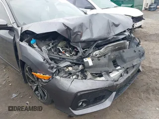 2019 Honda Civic Si z VIN 2HGFC1E52KH701117, wystawiony jako IAAI lot #41722505 z przebiegiem 64 085 mil mil oraz . Historia ofert i sprzedaży dostępna na DreamBid. Obrazek 6.