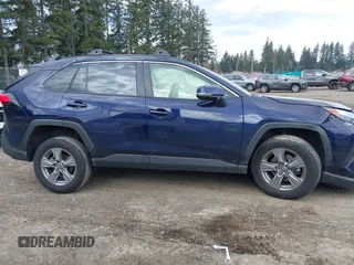 2023 Toyota RAV4 XLE with VIN JTMP1RFV1PD095688, listed as a IAAI auction lot 41874720 with 59,737 mi miles. Bid and sale history available at carsss.com. Image 13.
