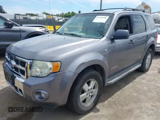 2008 Ford Escape XLT with VIN 1FMCU93128KA42482, listed as a IAAI auction lot 41979106 with 292,130 mi miles. Bid and sale history available at carsss.com. Image 2.