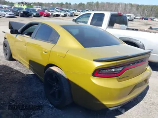 2016 Dodge Charger SE with VIN 2C3CDXBG5GH205540, listed as a IAAI auction lot 41655596 with 190,890 mi miles and . Bid and sale history available at carsss.com. Image 3.