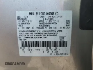 2019 Ford Edge Titanium с VIN 2FMPK3K92KBB42630, выставлен на аукционе Copart как лот 60984945 с пробегом 101 321 миль миль и Списание • Salvage title. История ставок и продаж доступна на DreamBid. Изображение 14.