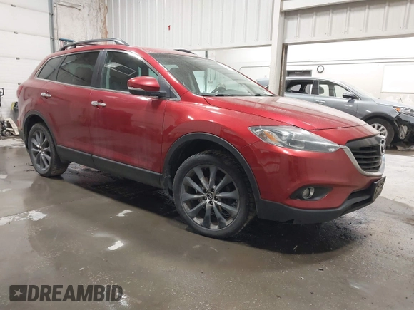 2015 Mazda CX-9 Grand Touring z VIN JM3TB3DAXF0464215, wystawiony jako IAAI lot #42043092 z przebiegiem 119 269 mil mil oraz . Historia ofert i sprzedaży dostępna na DreamBid. Obrazek 1.