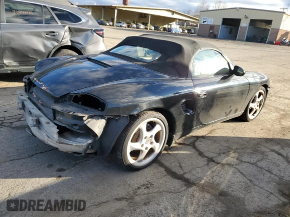 2000 Porsche Boxster z VIN WP0CA2980YU626358, wystawiony jako Copart lot #36977344 z przebiegiem 117 561 mil mil oraz Szkoda całkowita • Salvage title. Historia ofert i sprzedaży dostępna na DreamBid. Obrazek 3.