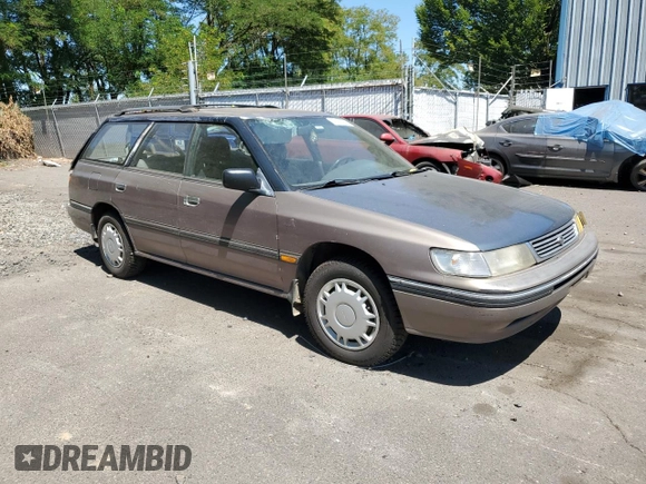 1993 Subaru Legacy L with VIN 4S3BJ6339P6948161, listed as a Copart auction lot 63123584 with 329,619 mi miles and Salvage Title. Bid and sale history available at DreamBid. Image 4.