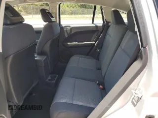 2009 Dodge Caliber SXT with VIN 1B3HB48A49D142621, listed as a Copart auction lot 55934095 with 158,885 mi miles and Non Repairable. Bid and sale history available at DreamBid. Image 10.