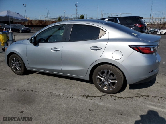 2019 Toyota Yaris Sedan L with VIN 3MYDLBYV2KY507562, listed as a Copart auction lot 64407884 with 85,982 mi miles and Salvage Title. Bid and sale history available at carsss.com. Image 2.