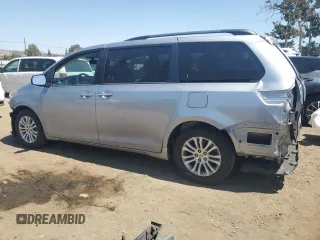 2012 Toyota Sienna XLE AAS with VIN 5TDYK3DC1CS204598, listed as a Copart auction lot 62293015 with 76,108 mi miles and Salvage title. Bid and sale history available at DreamBid. Image 2.