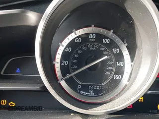 2015 Mazda 3 i SV with VIN JM1BM1T74F1246158, listed as a IAAI auction lot 41587923 with 147,001 mi miles. Bid and sale history available at carsss.com. Image 16.