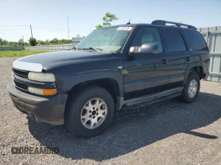 2004 Chevrolet Tahoe Z71 with VIN 1GNEK13T84R307582, listed as a Copart auction lot 61988735 with 242,054 mi miles and Clean title. Bid and sale history available at DreamBid. Image 1.