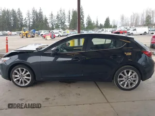 2014 Mazda 3 S Grand Touring with VIN JM1BM1M31E1150126, listed as a IAAI auction lot 41813519 with 103,578 mi miles and . Bid and sale history available at DreamBid. Image 14.
