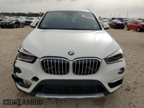 2019 BMW X1 sDrive28i with VIN WBXHU7C57K3H44192, listed as a Copart auction lot 49882335 with 79,350 mi miles and Salvage Title. Bid and sale history available at carsss.com. Image 5.