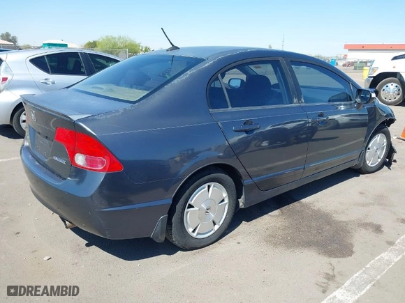 2008 Honda Civic Hybrid with VIN JHMFA36258S021538, listed as a IAAI auction lot 41857565 with 179,441 mi miles. Bid and sale history available at carsss.com. Image 4.
