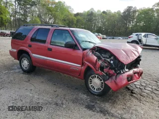 2001 GMC Jimmy SLE with VIN 1GKDT13W912214882, listed as a Copart auction lot 51258815 with 261,664 mi miles and Salvage Title. Bid and sale history available at carsss.com. Image 4.