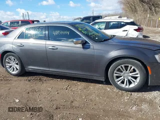 2017 Chrysler 300 with VIN 2C3CCAEG2HH559755, listed as a IAAI auction lot 41854444 with 135,744 mi miles. Bid and sale history available at carsss.com. Image 13.