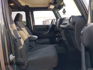 2018 Jeep Wrangler Unlimited Sport S with VIN 1C4BJWDG6JL854359, listed as a IAAI auction lot 42423170 with 84,470 mi miles and . Bid and sale history available at DreamBid. Image 5.