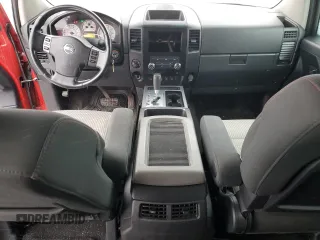 2011 Nissan Titan Pro-4X with VIN 1N6BA0EC5BN306753, listed as a Copart auction lot 49552545 with 176,617 mi miles and Salvage title. Bid and sale history available at DreamBid. Image 8.