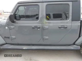 2022 Jeep Gladiator Willys with VIN 1C6JJTAMXNL137237, listed as a IAAI auction lot 41947651 with 55,199 mi miles and . Bid and sale history available at DreamBid. Image 14.