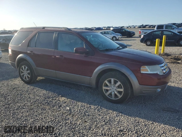 2008 Ford Taurus X SEL with VIN 1FMDK02W68GA27117, listed as a Copart auction lot 52310685 with 178,529 mi miles and Salvage Title. Bid and sale history available at DreamBid. Image 4.