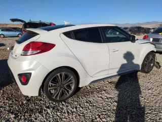 2016 Hyundai Veloster Turbo with VIN KMHTC6AE7GU284808, listed as a Copart auction lot 79896544 with 154,609 mi miles and Salvage Title. Bid and sale history available at carsss.com. Image 3.