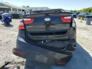 2014 Kia Rio EX z VIN KNADN4A31E6328144, wystawiony jako Copart lot #52235825 z przebiegiem 100 145 mil mil oraz Szkody całkowita. Historia ofert i sprzedaży dostępna na DreamBid. Obrazek 6.