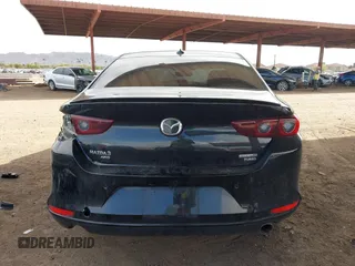 2023 Mazda 3 Premium Plus with VIN 3MZBPBEY6PM350056, listed as a IAAI auction lot 41940111 with 27,091 mi miles and . Bid and sale history available at DreamBid. Image 16.