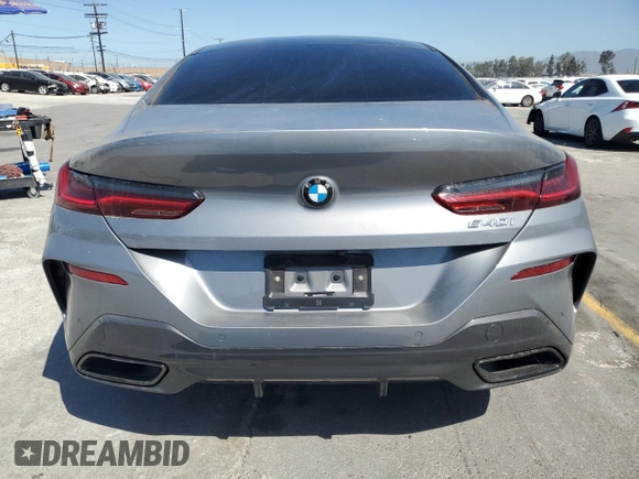 2024 BMW 8 Series 840i with VIN WBAGV2C08RCP97713, listed as a Copart auction lot 57355405 with 14,802 mi miles and Salvage title. Bid and sale history available at DreamBid. Image 6.