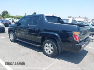 2006 Honda Ridgeline RTL with VIN 2HJYK16576H566002, listed as a IAAI auction lot 42595698 with 212,637 mi miles and . Bid and sale history available at DreamBid. Image 3.