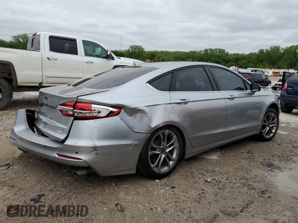 2020 Ford Fusion SEL с VIN 3FA6P0CD4LR148327, выставлен на аукционе Copart как лот 55099855 с пробегом Не указан миль и Списание • Salvage title. История ставок и продаж доступна на DreamBid. Изображение 3.