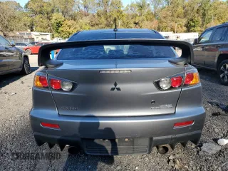 2014 Mitsubishi Lancer Evolution GSR z VIN JA32W8FV6EU018171, wystawiony jako Copart lot #77109934 z przebiegiem 83 467 mil mil oraz Tytuł czysty. Historia ofert i sprzedaży dostępna na DreamBid. Obrazek 6.