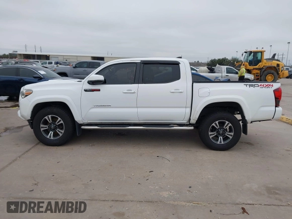 2019 Toyota Tacoma SR z VIN 3TMCZ5AN4KM220154, wystawiony jako IAAI lot #41602065 z przebiegiem 92 345 mil mil oraz . Historia ofert i sprzedaży dostępna na DreamBid. Obrazek 15.
