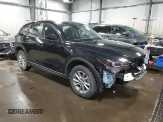 2023 Mazda CX-5 2.5 S with VIN JM3KFBAMXP0228593, listed as a Copart auction lot 42016515 with 22,371 mi miles and Salvage Title. Bid and sale history available at carsss.com. Image 4.