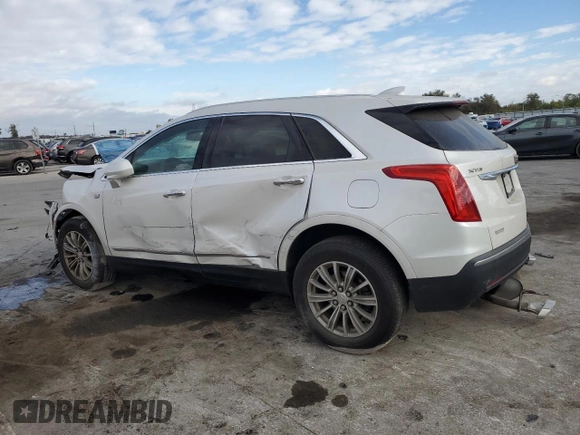 2018 Cadillac XT5 Luxury FWD with VIN 1GYKNCRS8JZ182473, listed as a Copart auction lot 60338405 with 76,595 mi miles and Salvage title. Bid and sale history available at DreamBid. Image 2.