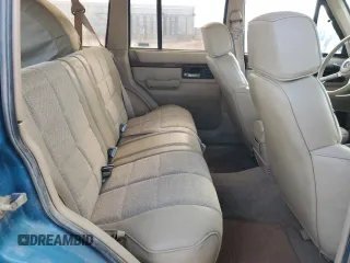 1993 Jeep Cherokee Country with VIN 1J4FJ78S8PL504126, listed as a Copart auction lot 46651035 with 153,170 mi miles and Clean Title. Bid and sale history available at carsss.com. Image 11.
