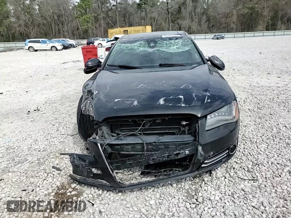 2014 Audi A8 3.0T z VIN WAURGAFD2EN002567, wystawiony jako Copart lot #48188395 z przebiegiem 159 477 mil mil oraz Szkody całkowita. Historia ofert i sprzedaży dostępna na DreamBid. Obrazek 13.