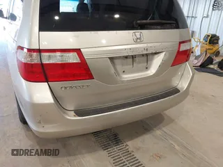 2006 Honda Odyssey EX-L with VIN 5FNRL387X6B449343, listed as a IAAI auction lot 42162759 with 242,590 mi miles. Bid and sale history available at carsss.com. Image 6.