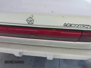 1994 Chrysler LeBaron z VIN 1C3AA3638RF322789, wystawiony jako IAAI lot #41654157 z przebiegiem 53 084 mil mil oraz . Historia ofert i sprzedaży dostępna na DreamBid. Obrazek 6.