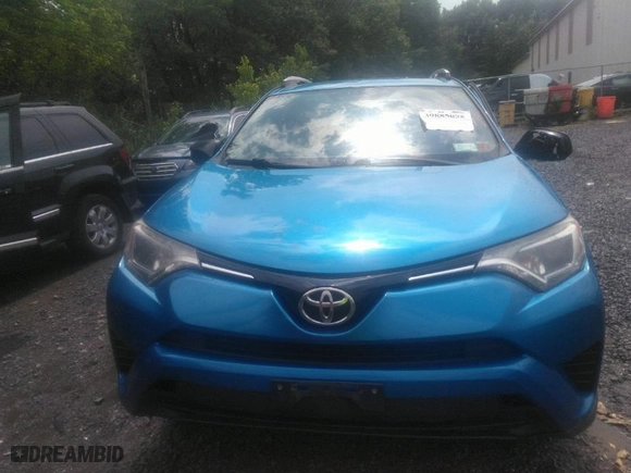 2016 Toyota RAV4 LE with VIN JTMBFREV8GJ102148, listed as a IAAI auction lot 39885095 with 131,835 mi miles. Bid and sale history available at carsss.com. Image 12.
