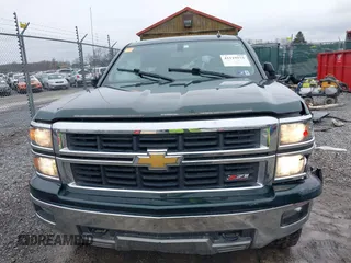 2014 Chevrolet Silverado 1500 LT with VIN 3GCUKREC1EG516826, listed as a IAAI auction lot 41119573 with 164,844 mi miles and . Bid and sale history available at DreamBid. Image 13.