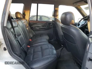 1996 Jeep Grand Cherokee z VIN 1J4FX78S6TC221815, wystawiony jako Copart lot #44000615 z przebiegiem 287 308 mil mil oraz Szkoda całkowita • Salvage title. Historia ofert i sprzedaży dostępna na DreamBid. Obrazek 11.