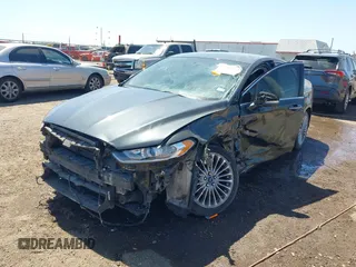2016 Ford Fusion Titanium with VIN 3FA6P0K98GR158877, listed as a IAAI auction lot 41994013 with 57,027 mi miles and . Bid and sale history available at DreamBid. Image 6.